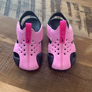 Pink and Black Nike Sandals